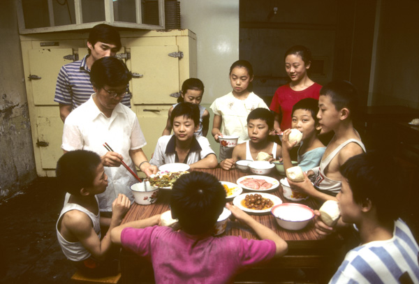 Students eat at acrobat school, Beijing