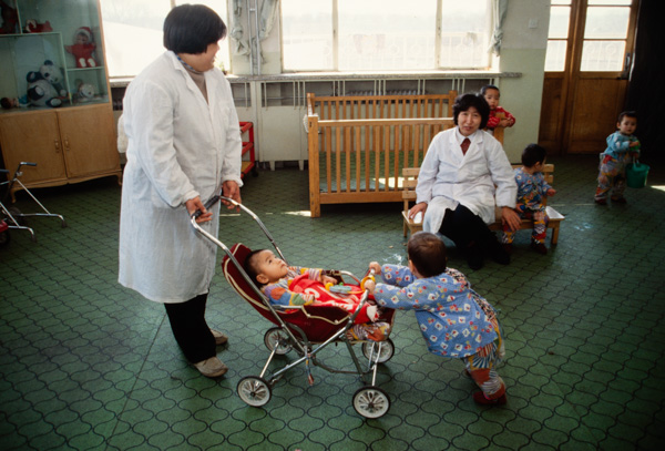 Children and nurses in orphanage, Beijing China