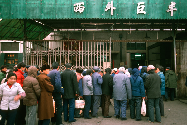 People queue at store, Beijing