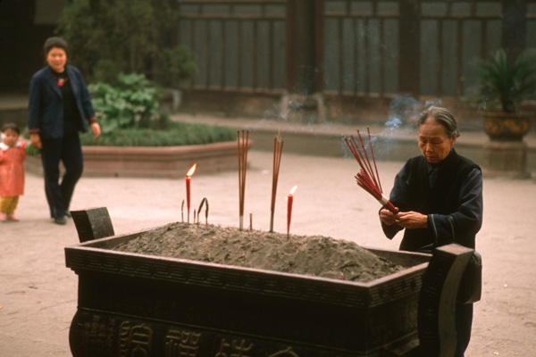 Worshiper at monastery, Hangzhou