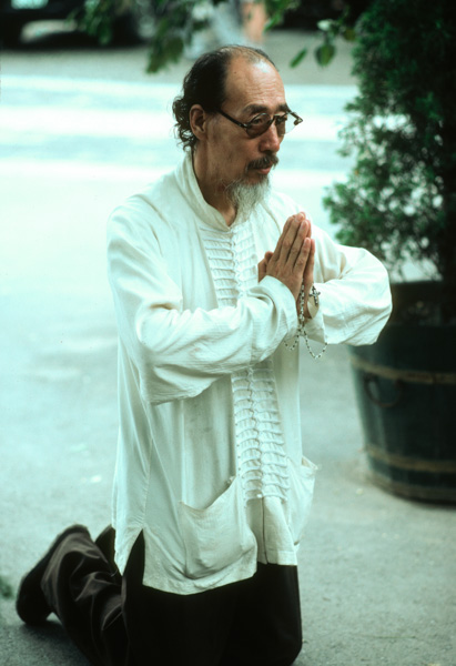 Catholic worshipper prays