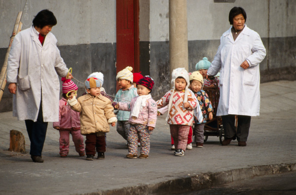 Nursery workers with children, Beijing