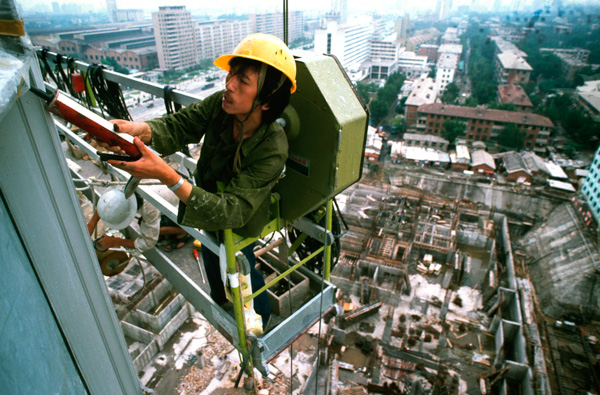 Construction worker high above ground