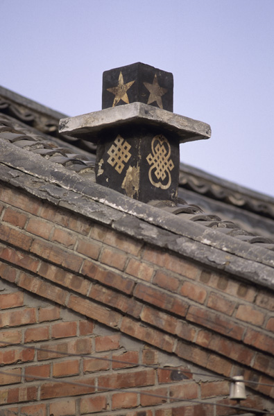 Decorated chimney on rural house