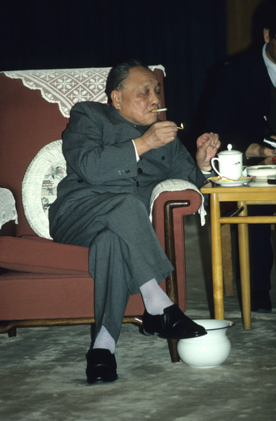 Deng Xiaoping smoking with spittoon