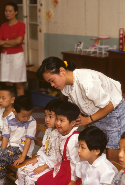 Children, teachers at kindergarten