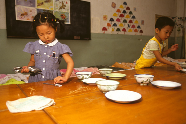 Children setting table, kindergarten, Beijing