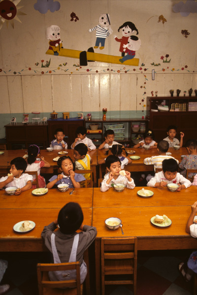 Children eat at Chinese kindergarten