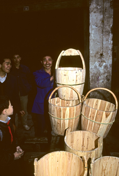 Cooper in a wooden bucket shop