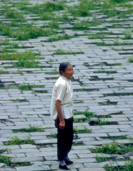 Woman with bound feet at the Forbidden City