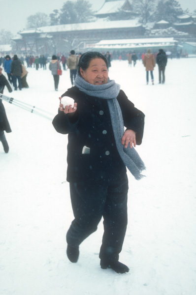 Woman with snowball, Forbidden City