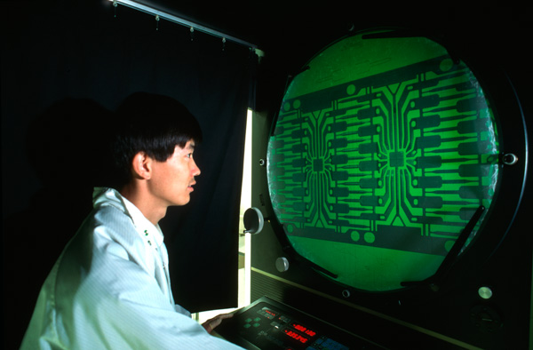 Worker at semiconductor plant
