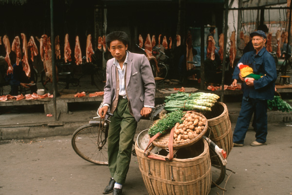Man sells produce from bicycle