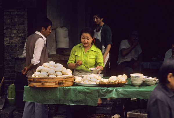 Woman sells steamed buns