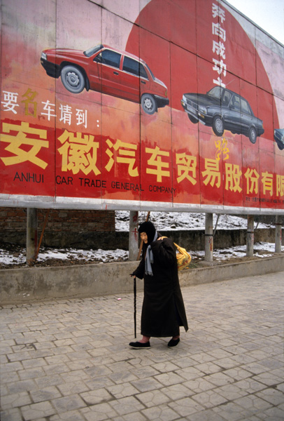 Woman and car billboard