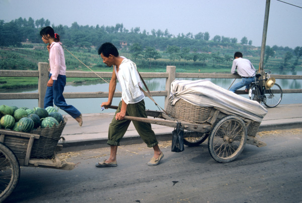 Man with hand cart, Henan