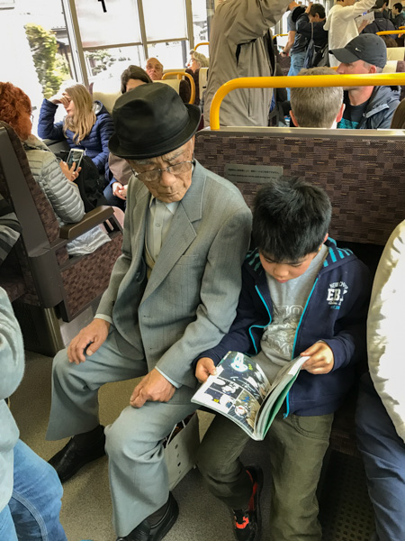 Man and grandson on train, Japan