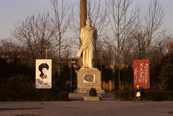 Lei Feng picture with Mao statue, Beijing