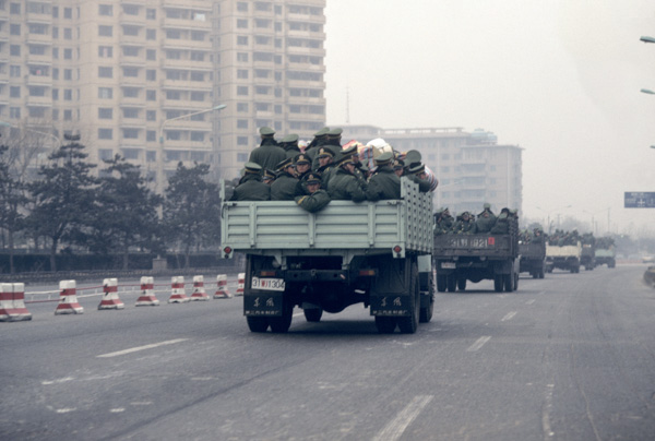 Solders transported by truck, China