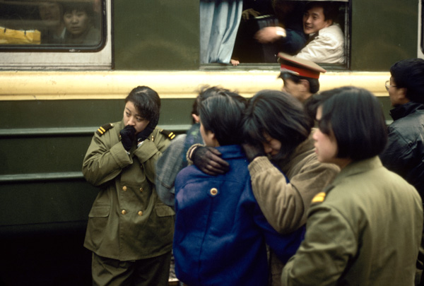 Woman crying as soldiers leave