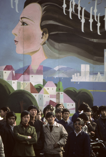 Crowd with poster, Qingdao, Cbina.