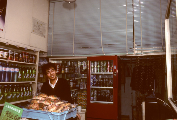 Man in tiny shop, Shanghai