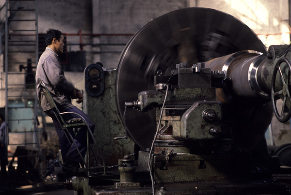 Worker in machine tool factory