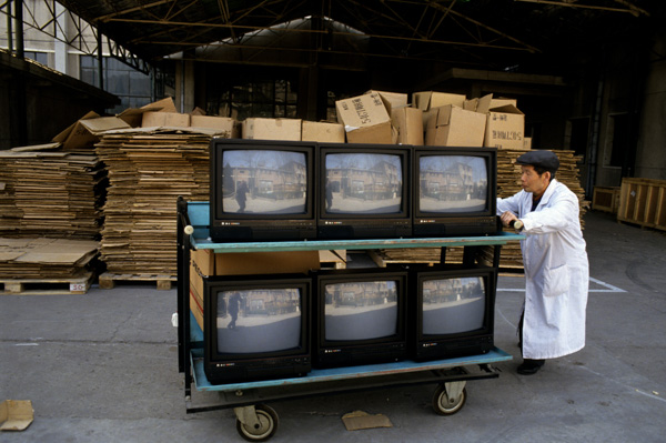 Worker at television factory