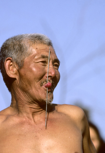 Man with metal in tongue, Beijing