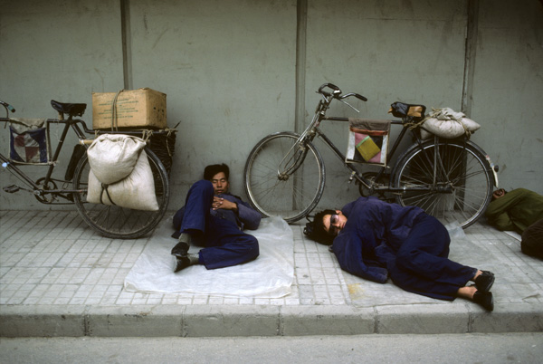 Men sleeping on street, Beijing