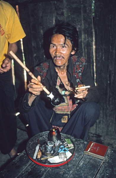 Man preparing opium, Chiang Mai, Thailand