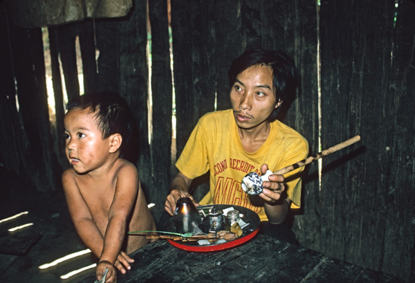 Man preparing opium, Chiang Mai, Thailand