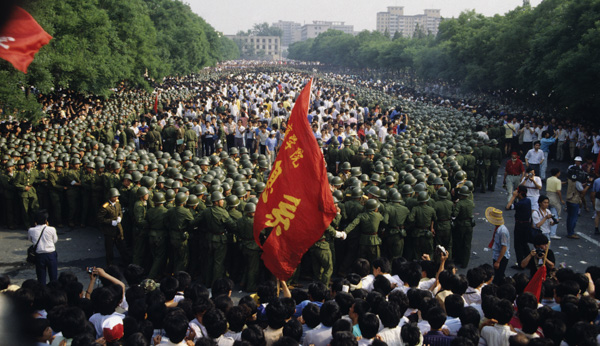 Troops surround protesters