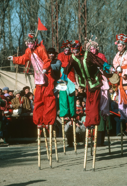 Stiltwalkers at temple fair, Beijing, China