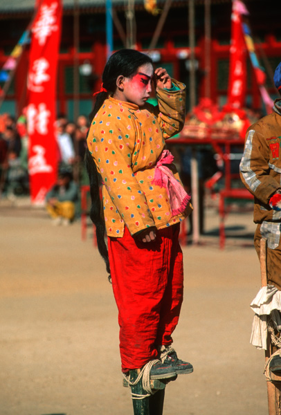 Stilt walkers, temple fair, Beijing, China
