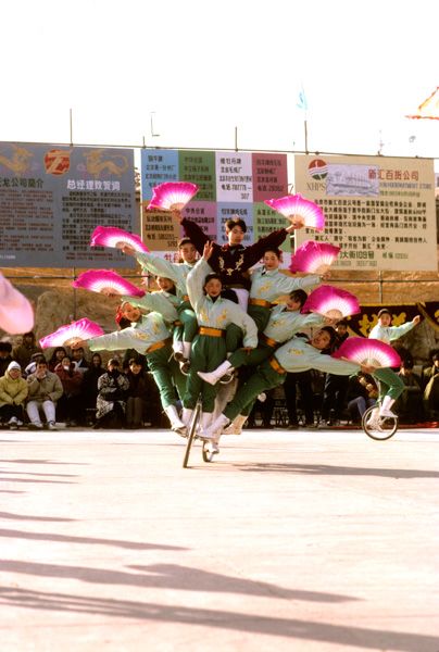 Acrobats on bicycle