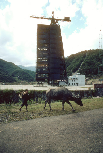 Farmer and water buffalo at Xichang satellite site