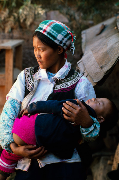 Yi minority woman and child, Xichang, China
