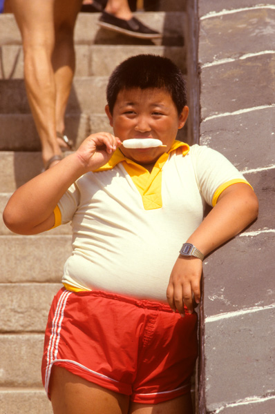 Boy eats ice cream