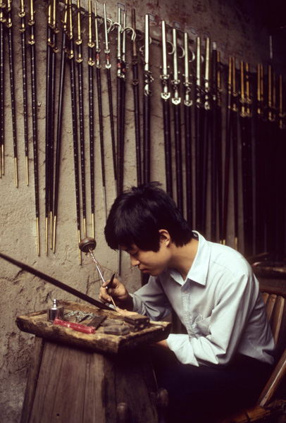 Man making scales