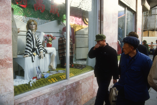 Man laughing at Western fashion