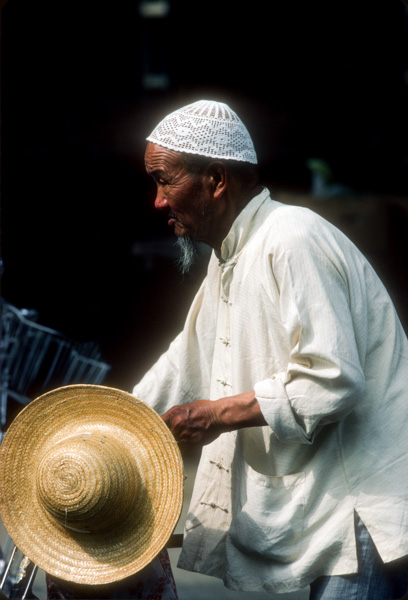 Muslim Man on a Bicycle