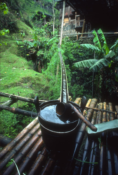 Wooden bucket and bamboo plumbing