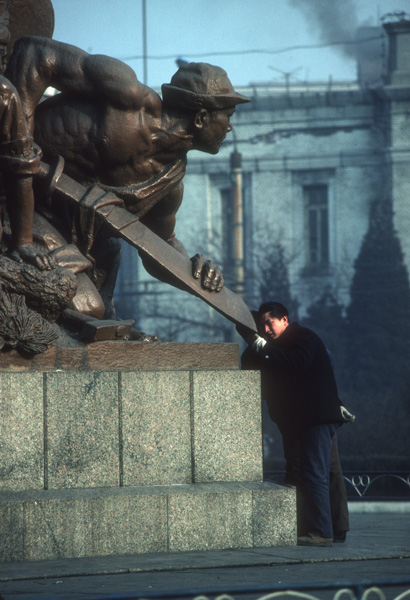 Man and statue, Beijing