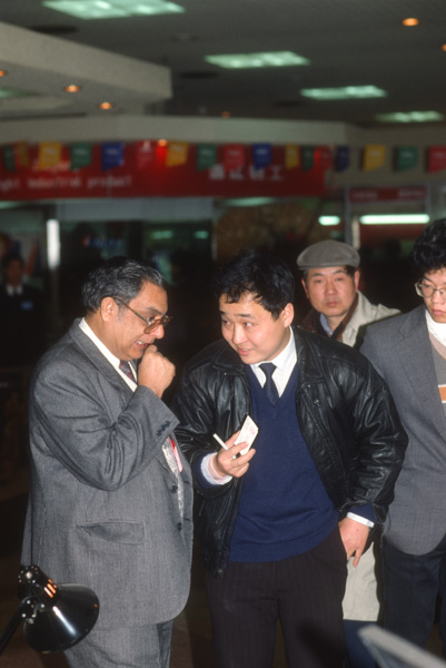Businessmen at trade fair