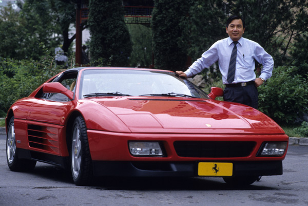 Li Xiaohua with China’s first Ferrari