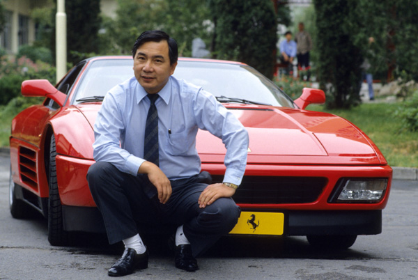 Li Xiaohua with China’s first Ferrari