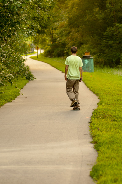 Skateboarding, nature trail, Apex, North Carolina