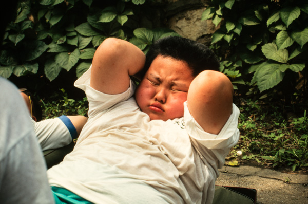 Child exercises at weight loss camp