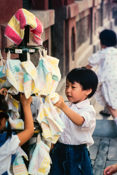 Child dries hands, Beijing kindergarten